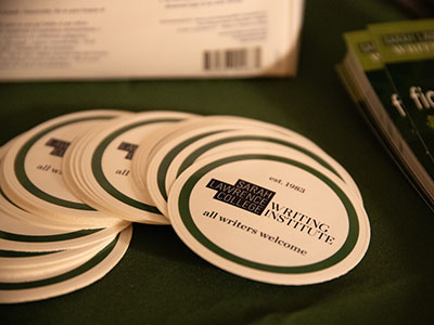 Photo of stickers that have the Writing Institute logo
