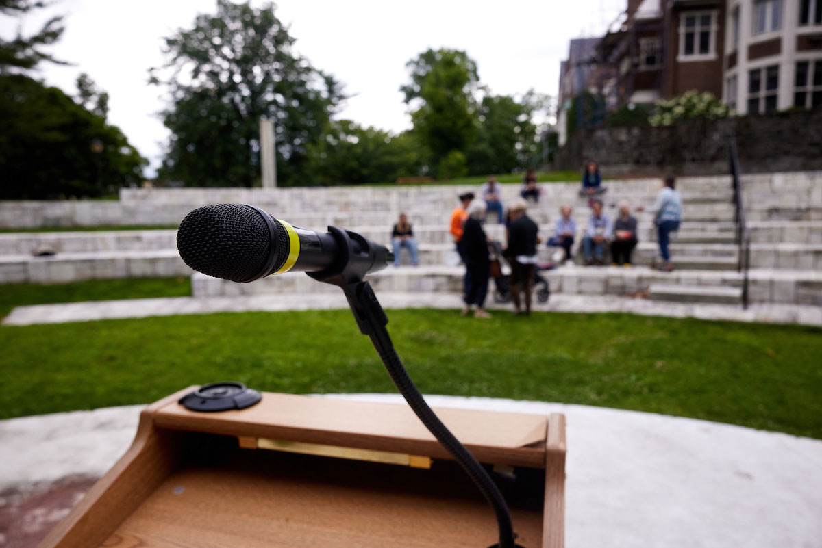 Microphone with crowd in the background