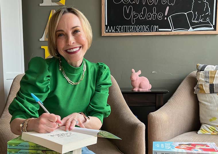 Eileen signing books